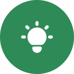 Here's an alt tag for the image: `White lightbulb icon, green circle`